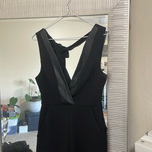 BCBGeneration Black Jumpsuit with Plunge Neckline and Tie Back